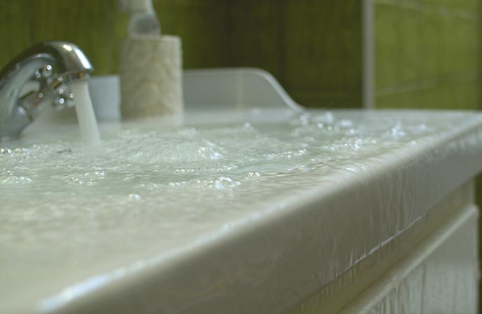 bathroom sink overflow water from the washbasin