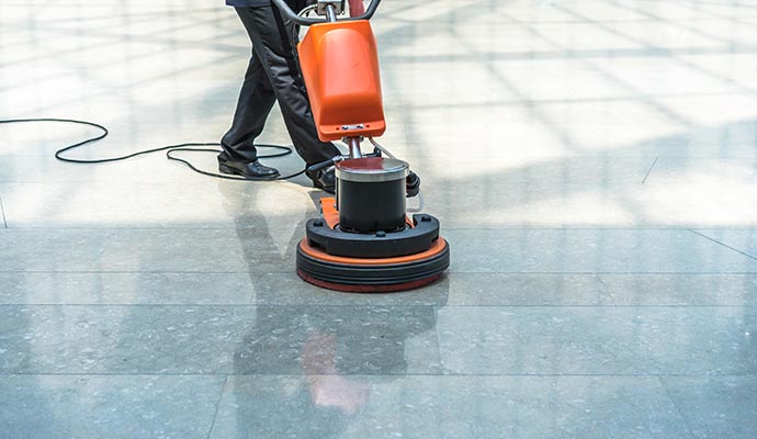 Professional floor cleaning service with specialized equipment