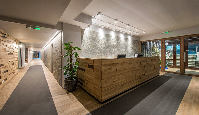 Clean and restored modern hotel lobby with reception area