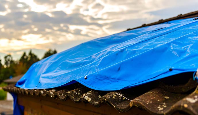 Roof tarping