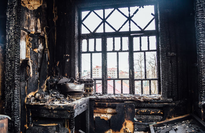 Kitchen damaged by fire.