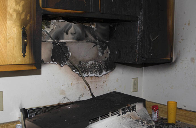 kitchen cabinet damaged because of fire