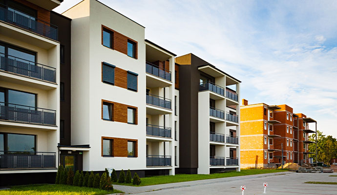 Modern balconied apartment buildings with wood accent exterior