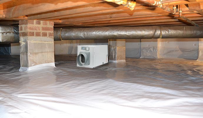 Installed dehumidifier in encapsulated crawl space