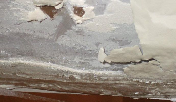 Peeling paint and bulging wall Peeling paint and bulging wall at ceiling area