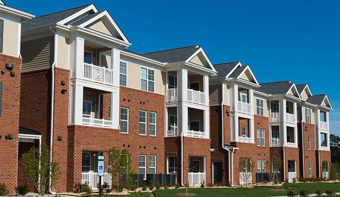 Modern multi-unit residential apartment building with several individual apartments