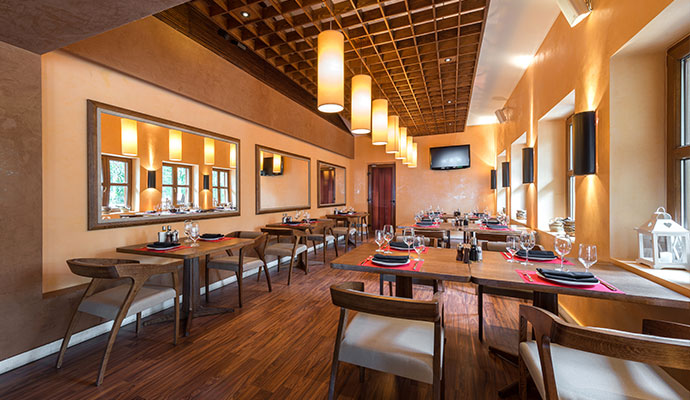 Restaurant dining area with warm lighting