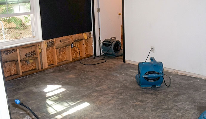 Using air mover for drying water