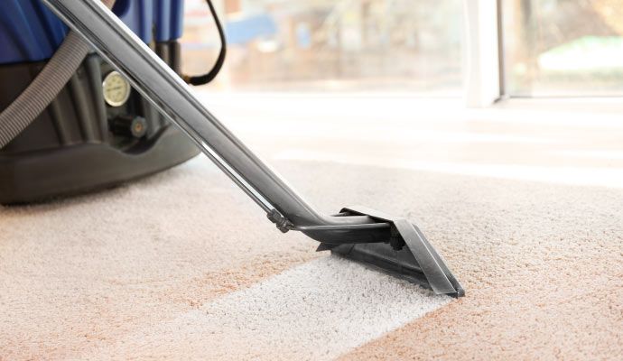 Carpet drying service using specialized equipment