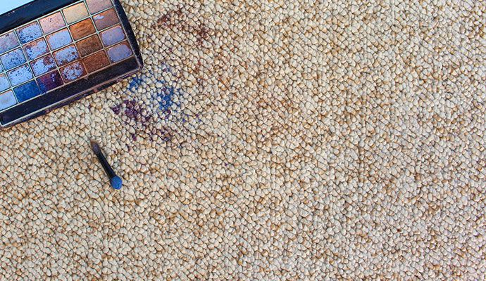 Visible makeup stain on the carpet