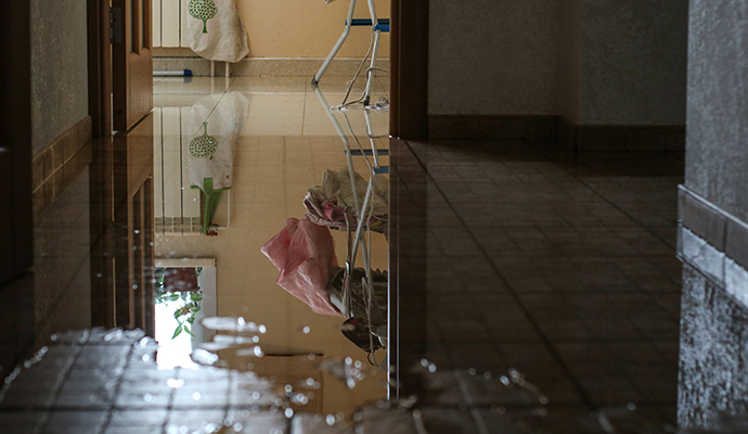 Water on floor from a plumbing leak